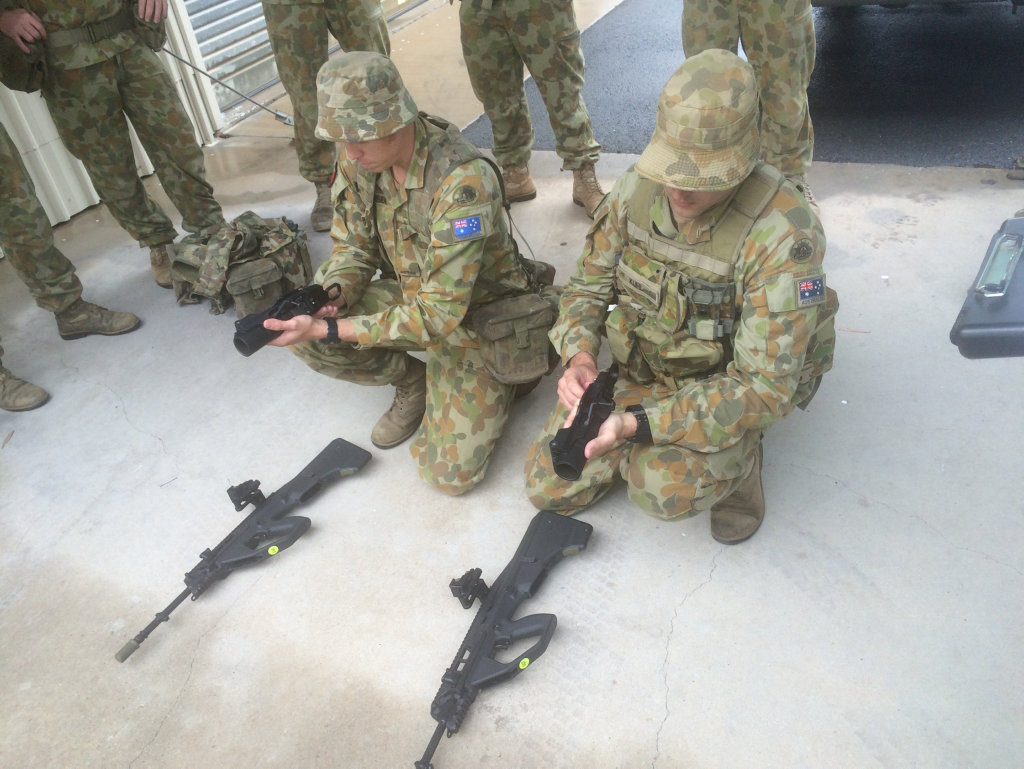 Gladstone soldiers being trained on the new EF88 service rifle with grenade launcher attachment.